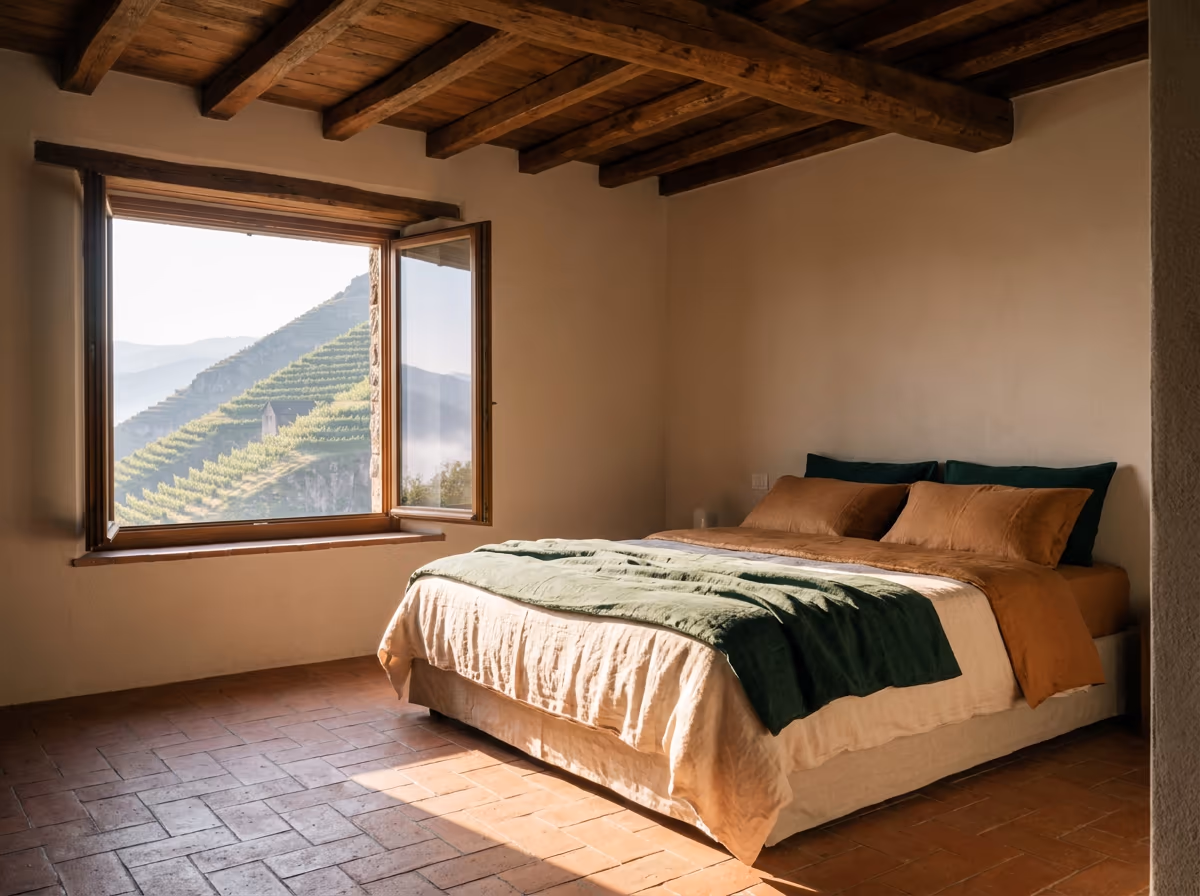 Camera con letto in lino e travi a vista (foto indicativa)